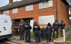 Melton Borough Council officers with Police closing a property